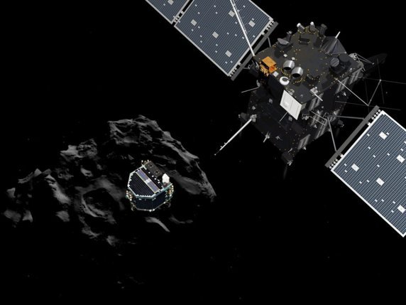 Cette animation de l'ESA montre Rosetta et ses panneaux solaires ainsi que l'atterrisseur Philae peu après sa séparation du vaisseau-mère, avec Tchouri en arrière-plan (archives). © KEYSTONE/EPA/ESA / ATG MEDIALAB / HANDOUT