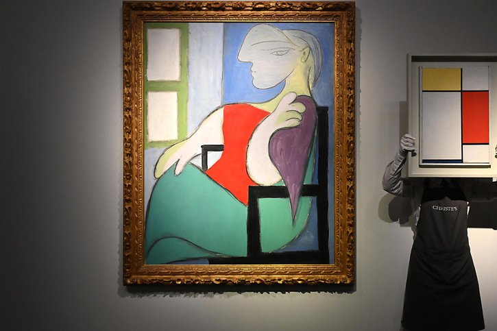 Le tableau "Femme assise près d'une fenêtre (Marie-Therese)" est la cinquième oeuvre de Pablo Picasso à dépasser la barre des 100 millions de dollars (archives). © KEYSTONE/EPA/NEIL HALL